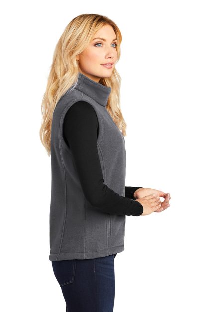 Women's fleece vest, embroidered with SB logo on front chest. Side view.